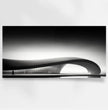 Erlebe die zeitlose Eleganz eines modernen Architekturmeisterwerks mit unserem exklusiven Panoramabild - posterfolio.de