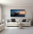 Panorama Wandbild: Einsames Boot im Sonnenuntergang - posterfolio.de