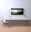 Panorama Wandbild: Zeitloser Leuchtturm an einem ruhigen Meer - posterfolio.de